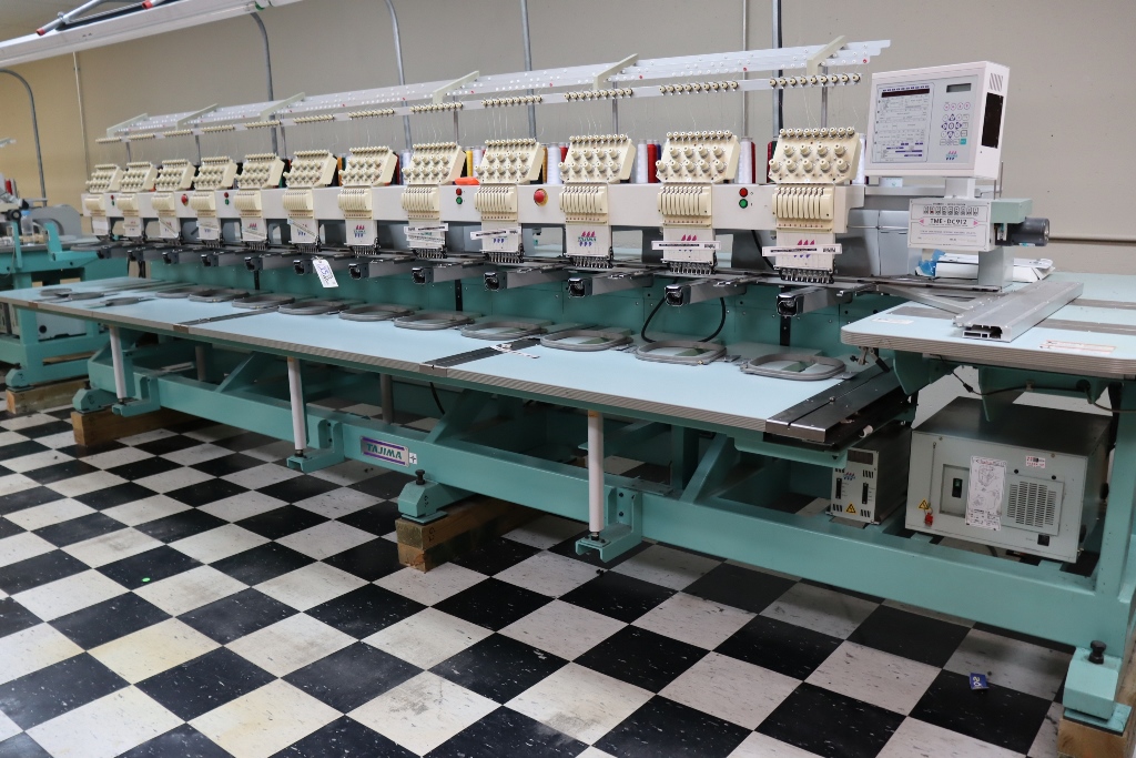 Item Image for Jym Bag Co. has decided to liquidate these assets in an online auction. Highlights to include: 2 Tajima TME-DC912 electronic 12 head 9 stitch embroidery machines, Riley Hopkin screen press, Black Body conveyor dryer, Impulse foot sealers
